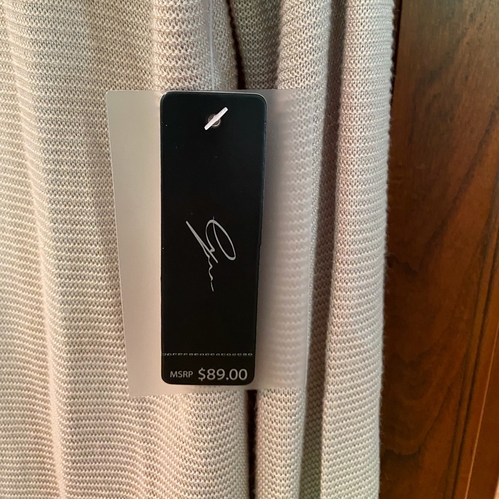NWT Pretty light weight waterfall top.